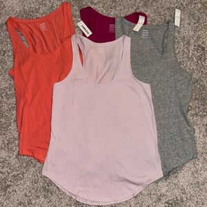 Old navy relaxed XS coral racerback tank top. Scoop/tulip hem. Extra small.
